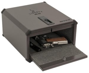 a liberty safe containing a gun