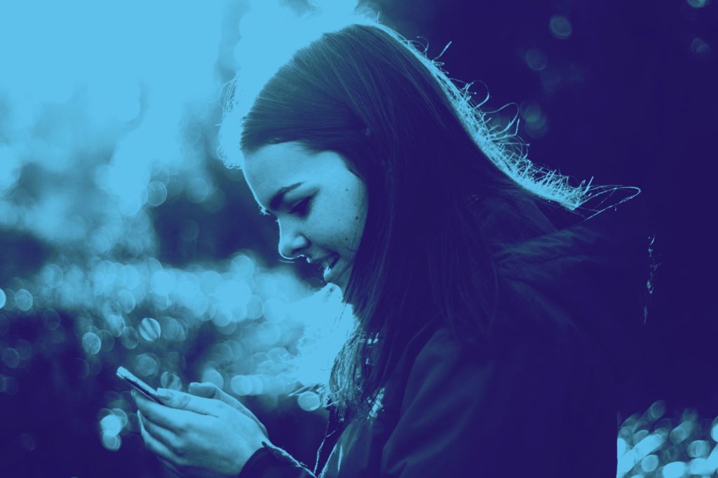 Belong Mobile Review - Image of woman using phone