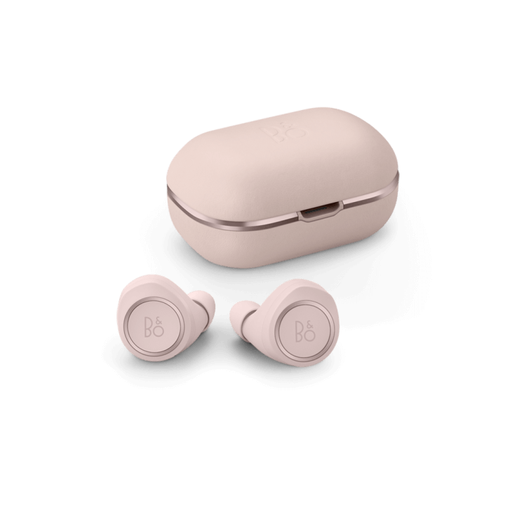 A pair of pink Bang and Olufsen Beoplay E8 2 earbuds with case