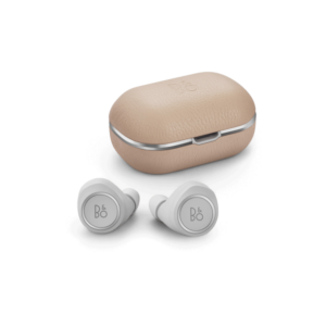 A pair of natural-coloured Bang and Olufsen Beoplay E8 2 earbuds with case