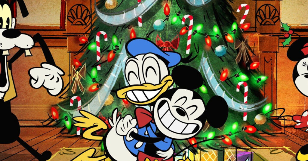 Mickey Mouse and Donald Duck in front of a Christmas tree