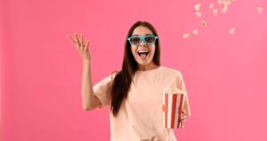Photograph of woman delighted to be streaming movies in Australia