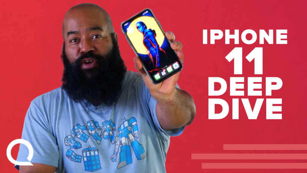 Tshaka Armstrong holding an iphone 11 for a video review