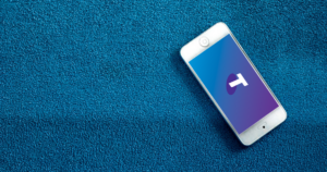 Photograph of prepaid telstra handset on blue background