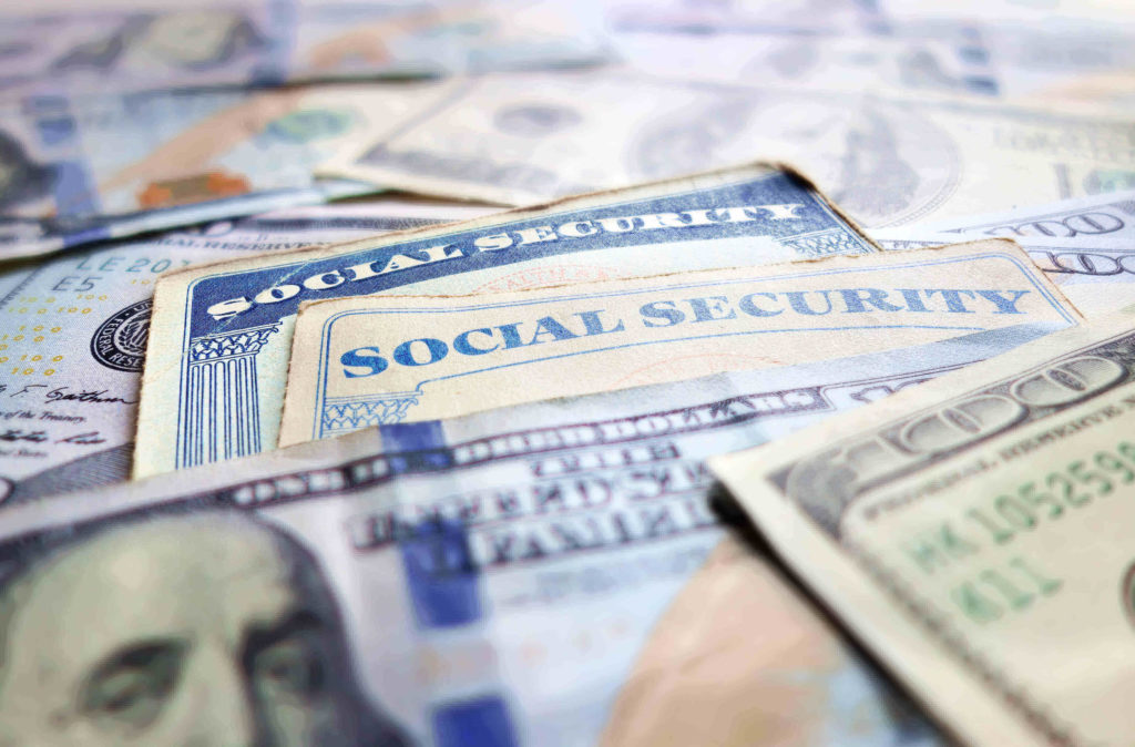 Social Security cards and money