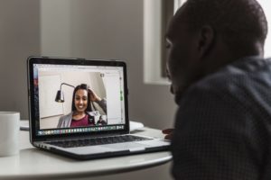 Man and woman having a video chat