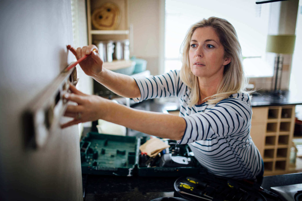 Woman prepping for DIY home security