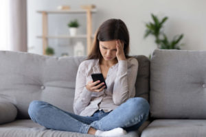 Woman resetting her iPhone