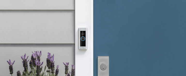 Ring Video Doorbell Pro installed next to a blue front door