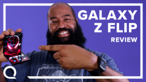 A man pointing to a flip smartphone next to text "Galaxy Z Flip Review"