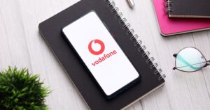 Stock photograph of the Vodafone logo on a smartphone