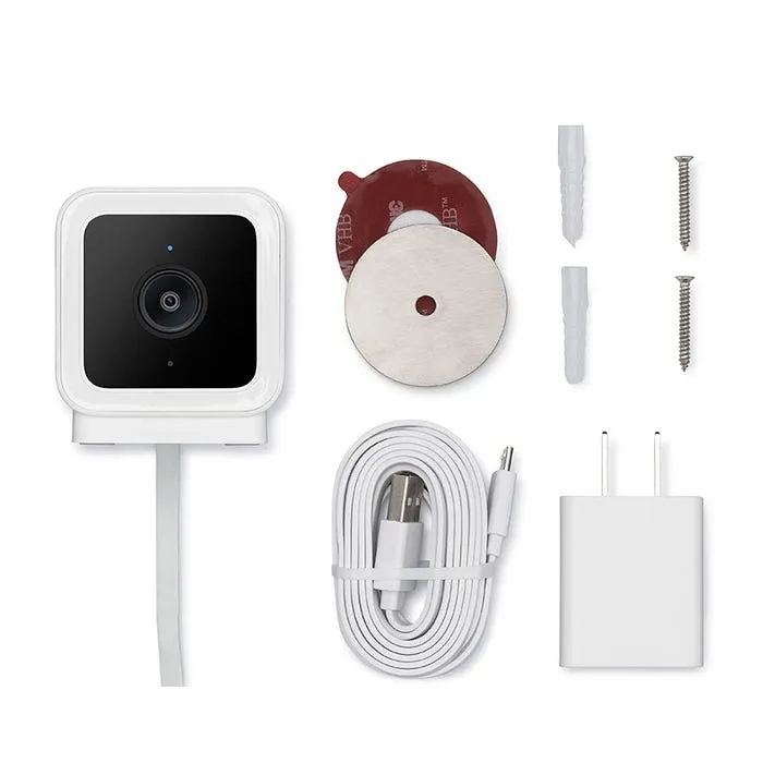Wyze Cam v3 beside its included accessories