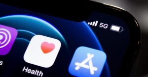 Photograph of iPhone screen with 5G recepttion