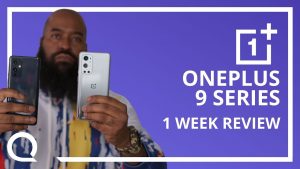 A man is holding up two smartphones next to text 'OnePlus 9 Series 1 Week Review'