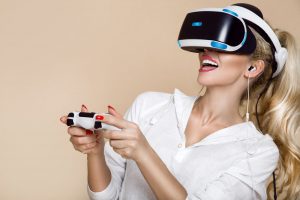 Photograph of woman using PlayStation VR headset