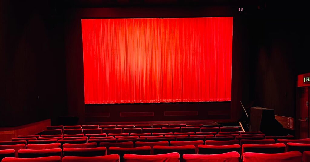 Image of empty cinema seats and screens