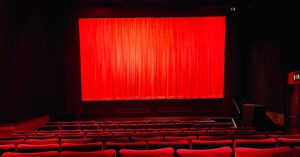 Image of empty cinema seats and screens