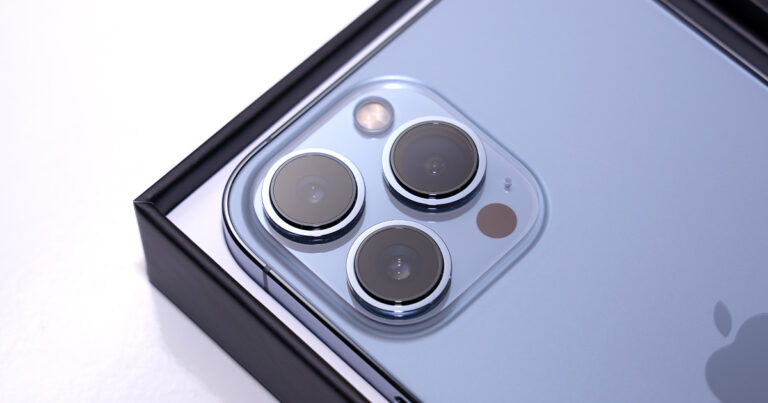 Close-up photograph of the iPhone 13 camera