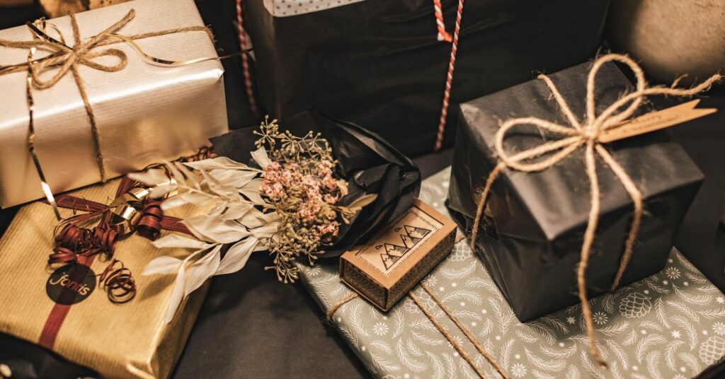 black and gold gifts on a table