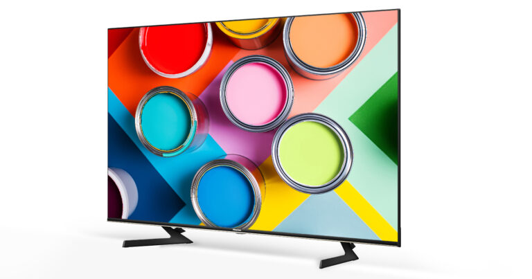 The Hisense Series A7G 4K TV on a white background. On the TV, there is an image of different colours of open paint cans, shot from overhead.