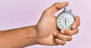 Stock photograph of someone using a stopwatch