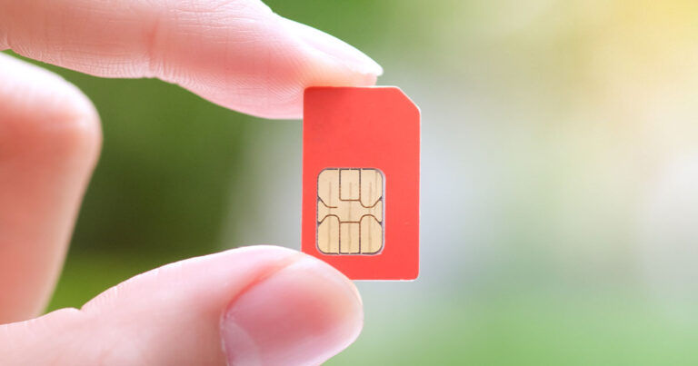 Stock photograph of a red SIM card