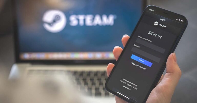 Photograph of someone using Steam on PC and smartphone