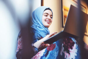 Middle Eastern lady using laptop