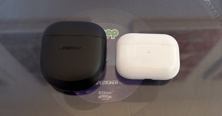 Bose QuietComfort Earbuds II next to AirPods Pro 2