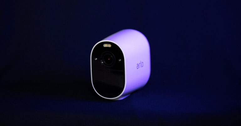 arlo-essentials-spotlight-cam on blue backdrop