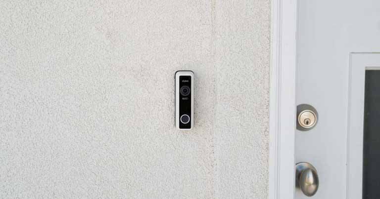 vivint video doorbell installed next to front door