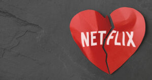 Graphic of Netflix logo on a broken paper heart