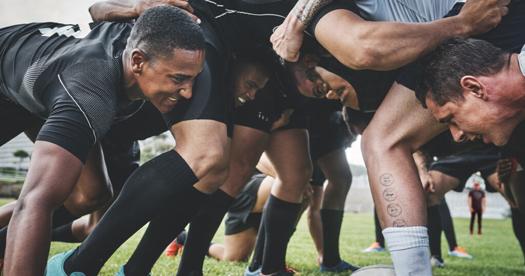 Photograph of people playing Rugby