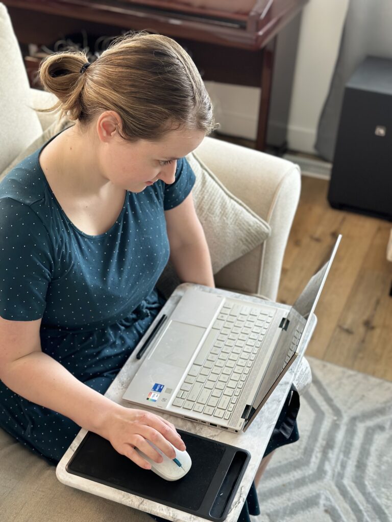 A WFH expert using a lap desk