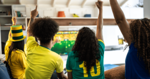 family watching the women's world cup and cheering
