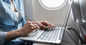 using a laptop on a plane