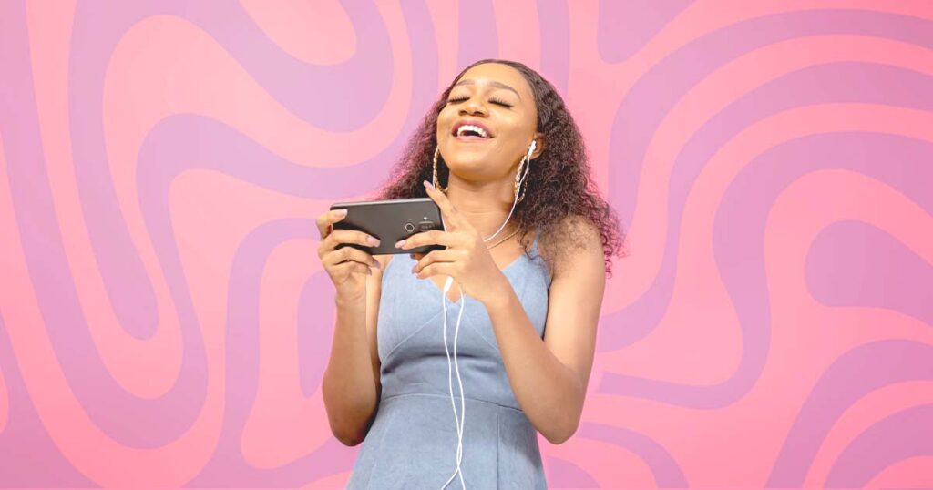 Graphic of a young woman enjoying fast mobile speeds over a pink wavy background