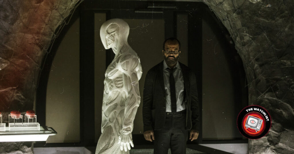 Screenshot from the TV show Westworld featuring a human character and a synthetic human with no skin - The Watchlist