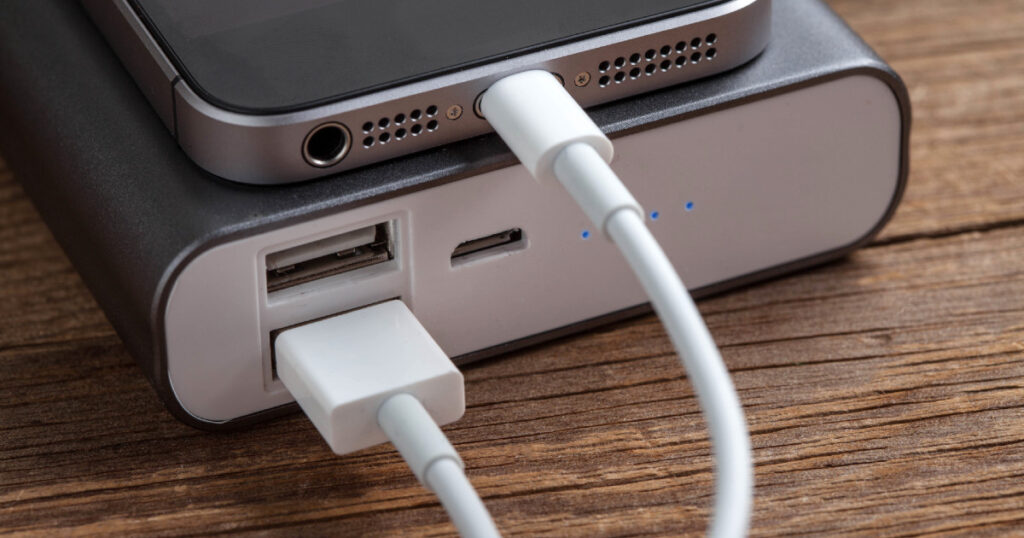iPhone attached to power bank