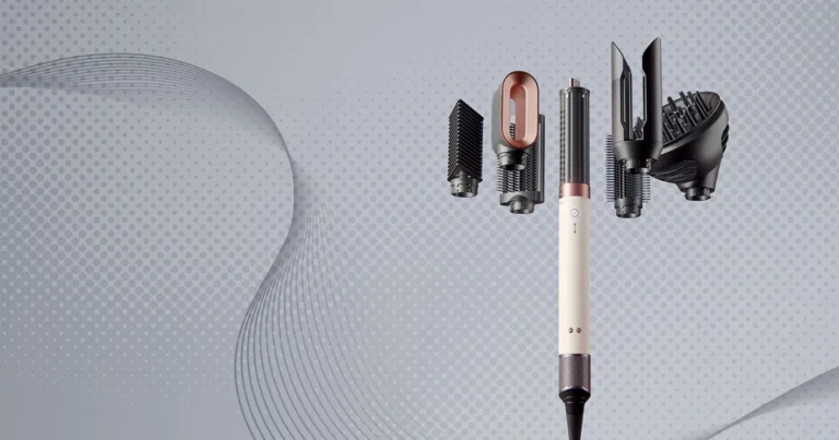 Dyson airwrap co-anda 2x with attachments, floating on a grey background