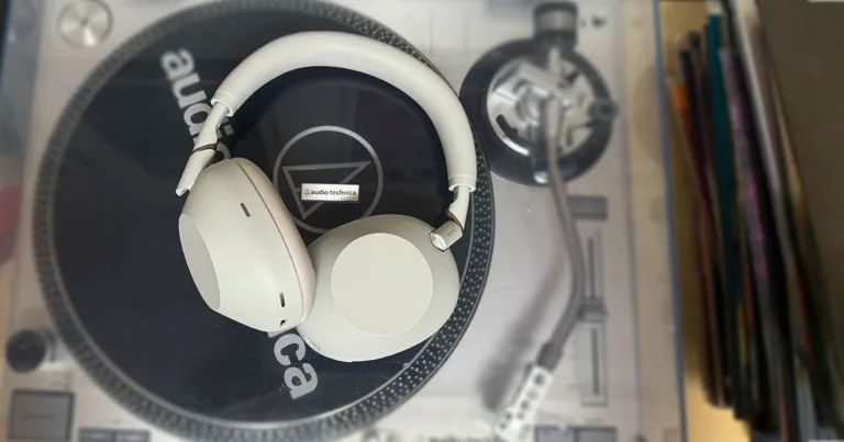 Sony WXM6s sitting on top of a record player - birds eye view