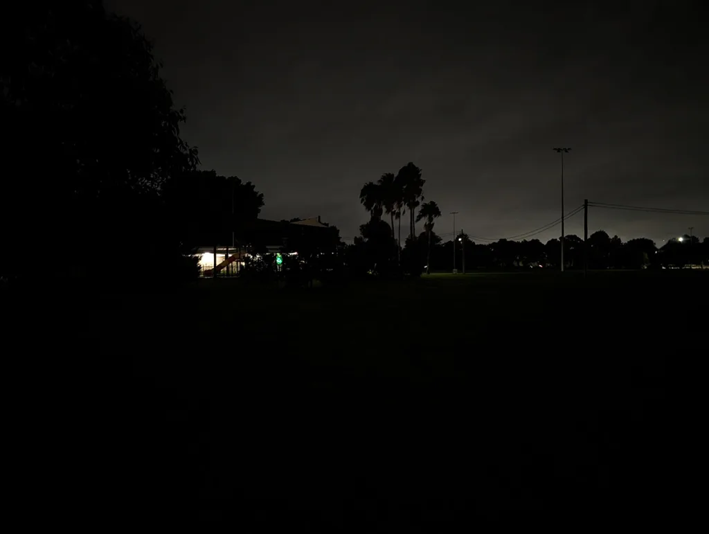 Pixel 10a camera sample photo of a park at night without night mode