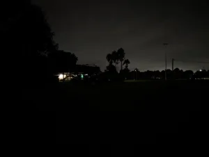Pixel 10a camera sample photo of a park at night without night mode