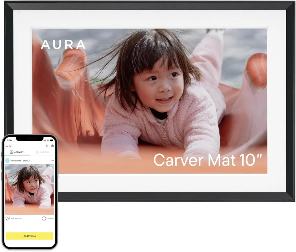 Aura digital photo frame displaying a family photo on a shelf