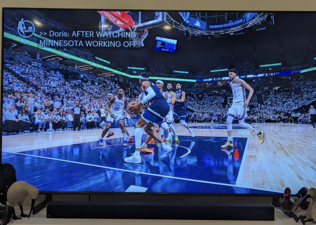 Hulu with Live TV streaming an NBA playoff game between the Minnesota Timberwolves and Oklahoma City Thunder on a large TV screen.
