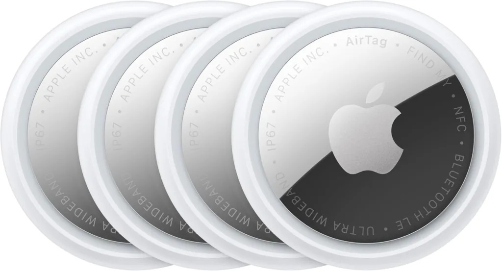 4-pack of Apple Airtags arranged in a line across a white background.