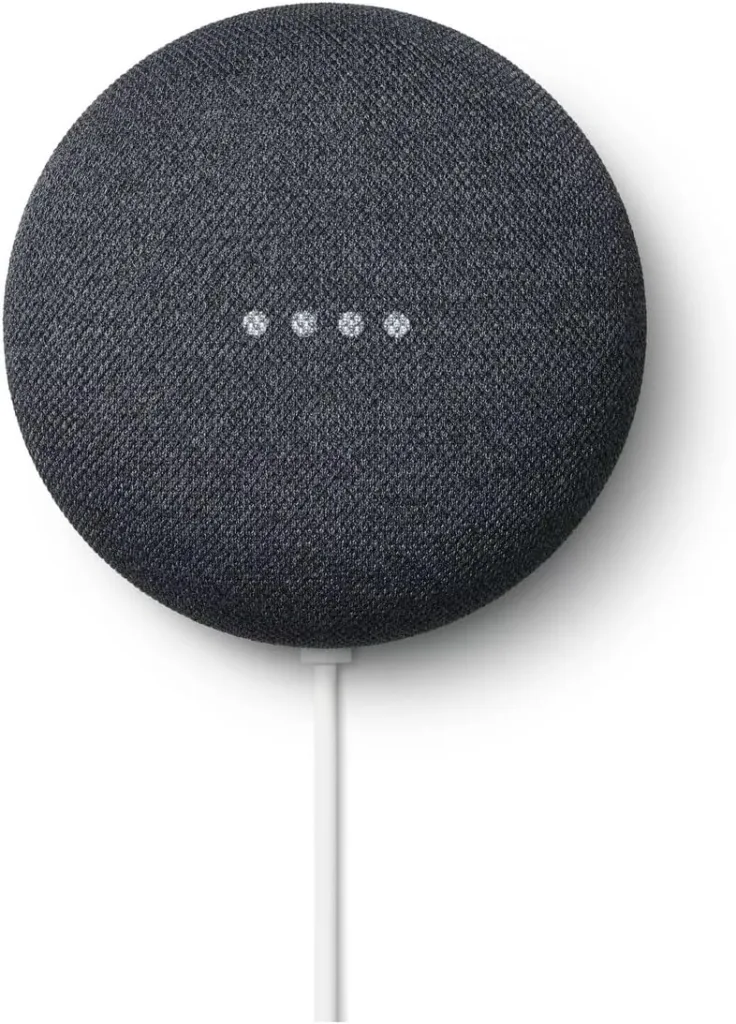 The Google Nest Mini against a white backdrop.