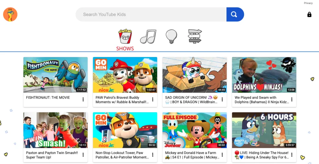 YouTube Kids homepage showing the Shows category with titles like “Fishtronaut,” “Paw Patrol,” and “Mickey Mouse Funhouse.”