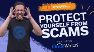 Man reacting to a scam alert while wearing an OmniWatch t-shirt, REVIEWS.org graphic reading "Protect Yourself From Scams featuring OmniWatch"