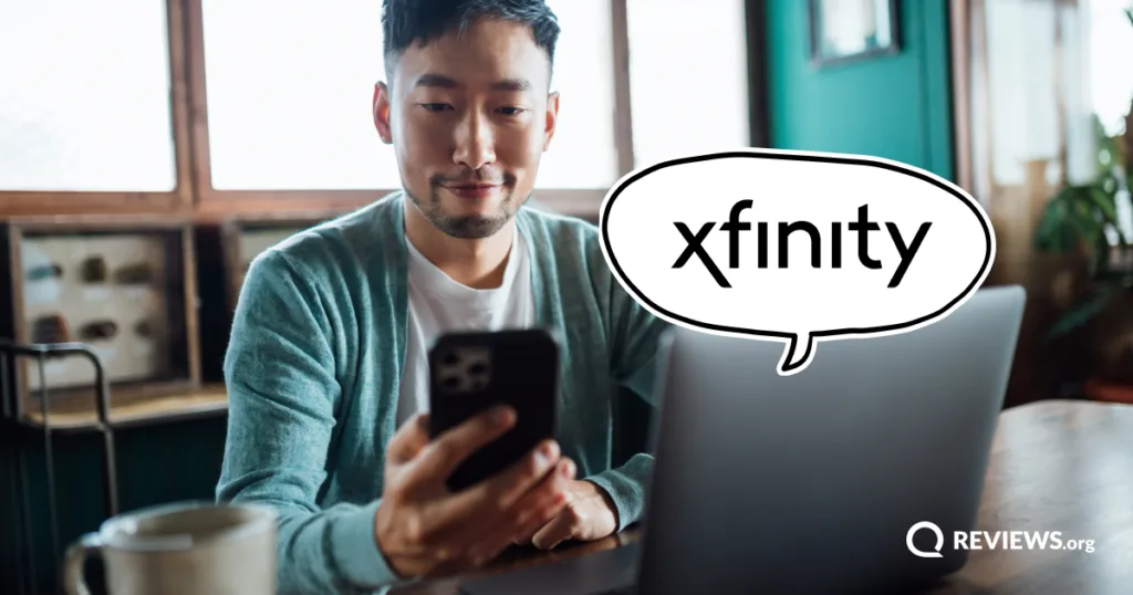 Man checking his phone and laptop with a speech bubble showing the Xfinity logo, exploring how Xfinity's internet technology stacks up for everyday use.